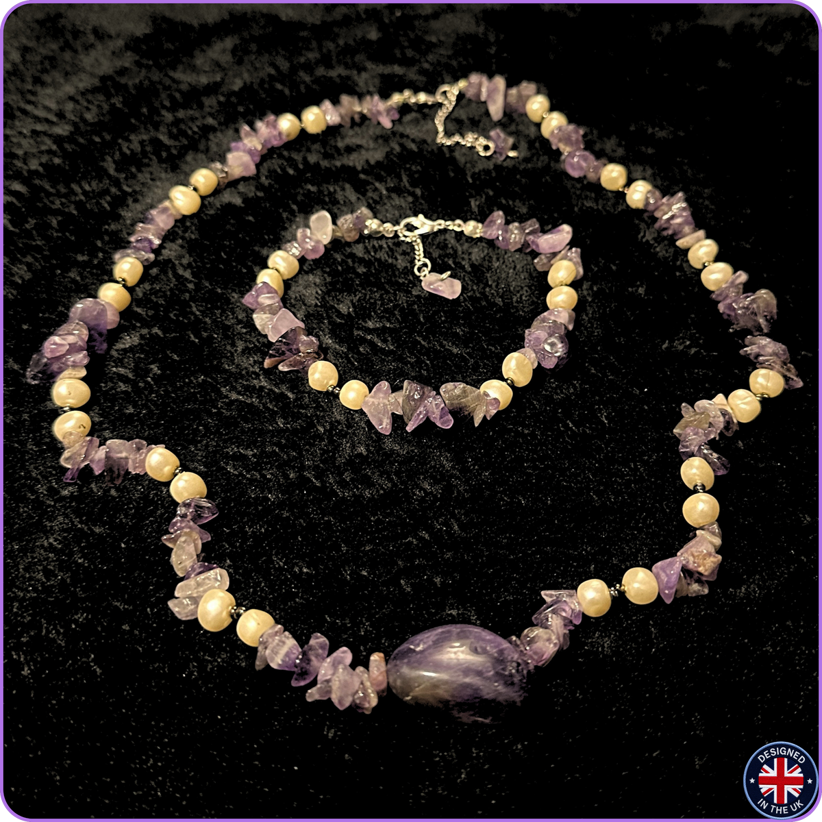 A matching jewelry set featuring a necklace and bracelet made of purple amethyst crystal chips and cream-colored round beads, displayed on a black velvet background.