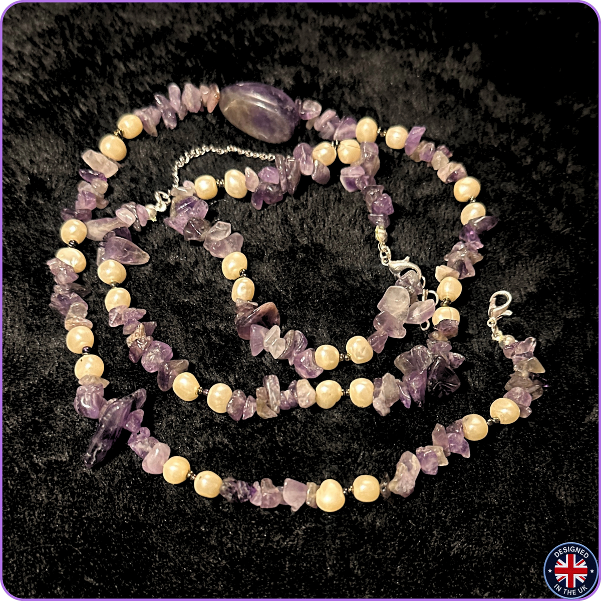 A beaded necklace and matching bracelet made of purple amethyst chip stones and cream-colored round beads, displayed on a black textured background.