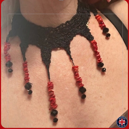 black necklace with red coral and black silk on model