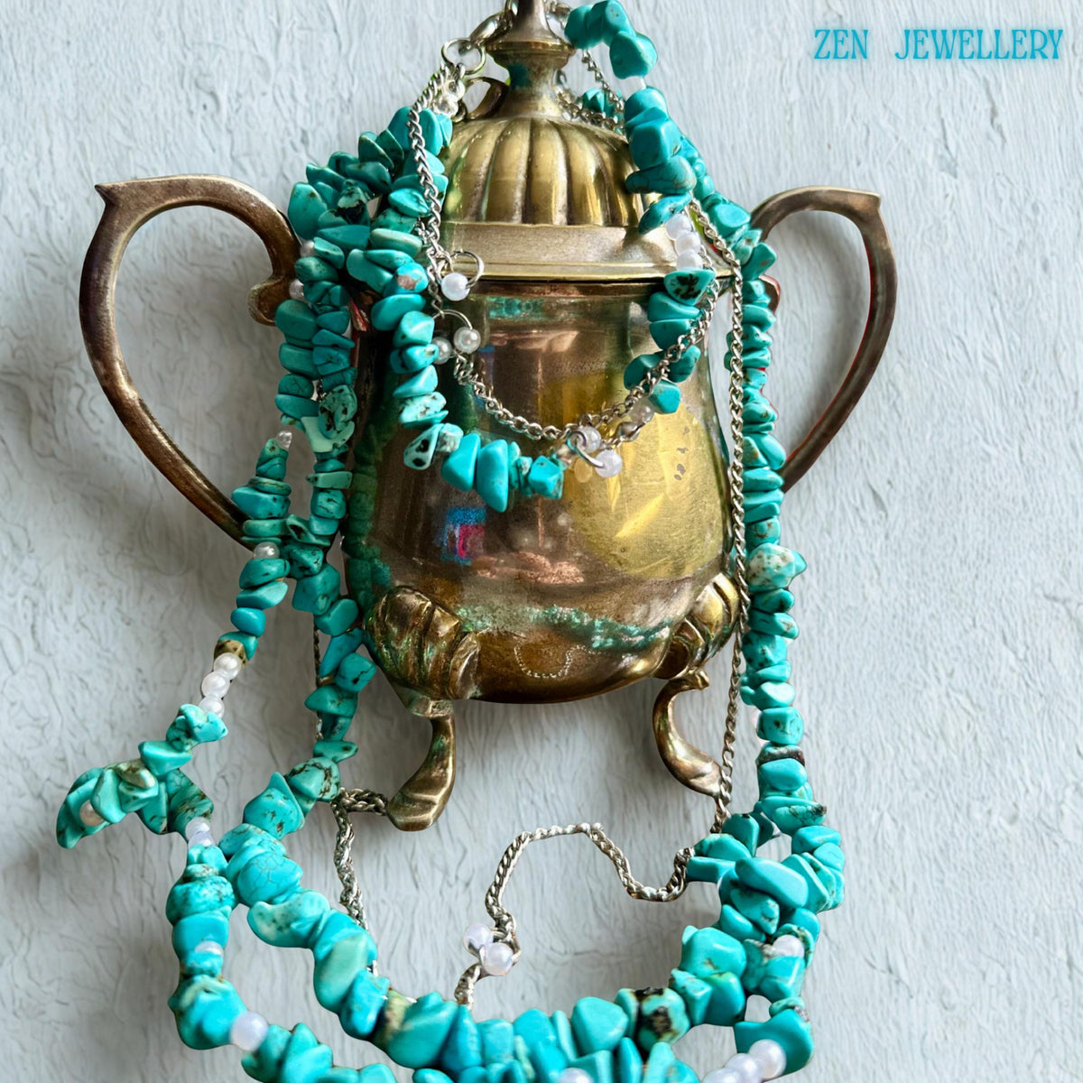 Handmade artisan jewellery with vibrant turquoise chips on stainless steel chain, perfect for layering.