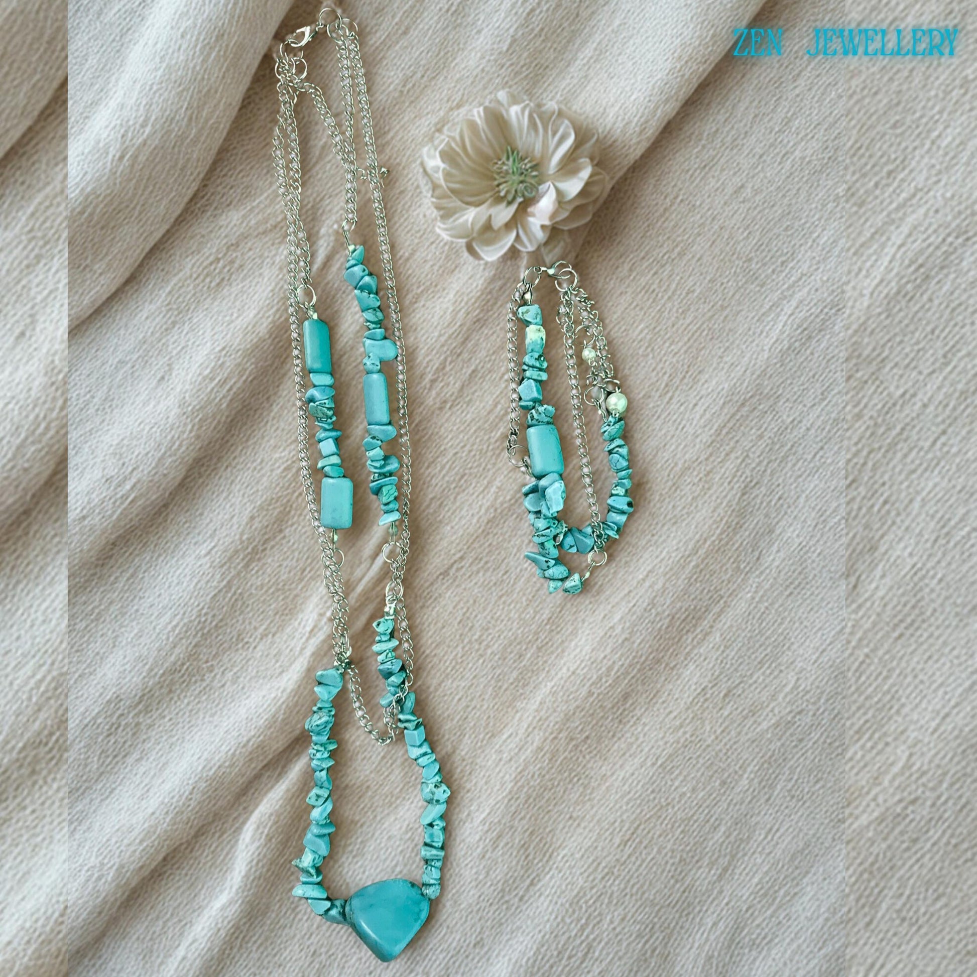 The necklace lay vertically to highlight length and drape, helping buyers visualise how it complements different necklines.
Focus on bead arrangement showing asymmetrical placement typical of handcrafted jewellery, adding uniqueness and artisanal appeal.
Detail of connector rings between chains and beads, showing sturdy construction and thoughtful design.