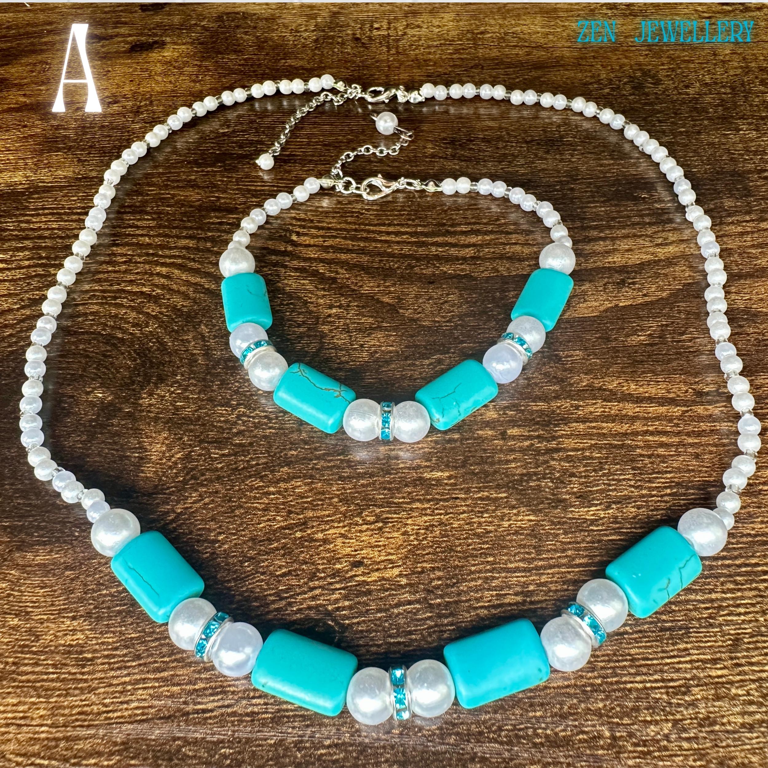 The piece is photographed flat. The texture stands out well. The colours contrast beautifully. The sizing is shown by the full layout. The necklace appears medium length. The bracelet looks comfortable to wear. The clasp detail is easy to see. The finish feels refined. The overall look is natural and stylish.