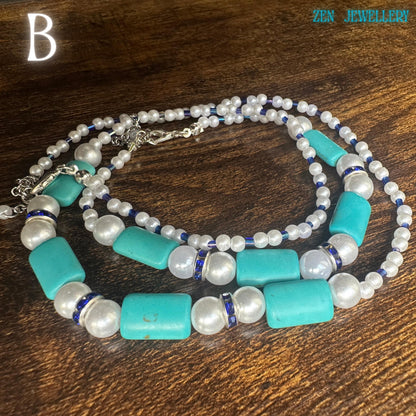 Full jewellery set with turquoise rectangular stones and pearls displayed on a clean neutral background
