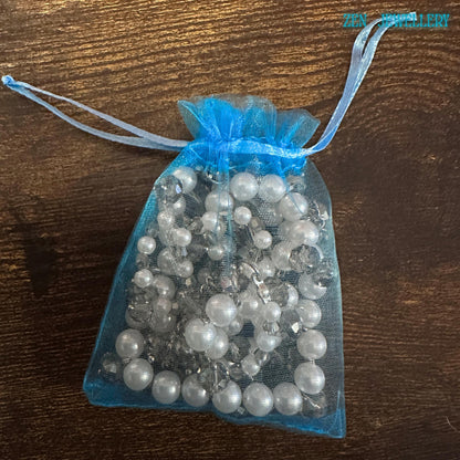 Sparkling Austrian crystals and white pearls on a silver chain necklace, styled for fashion-forward women in a gift bag from Zen Jewellery