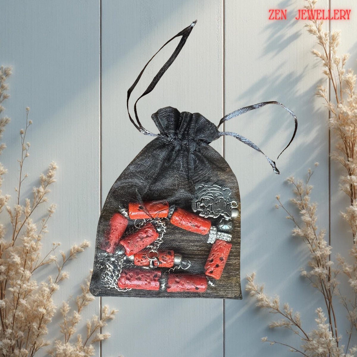 fashion necklace with bold coral beads and stainless steel accents, styled to highlight its vibrant and elegant aesthetic in a gift bag from Zen Jewellery