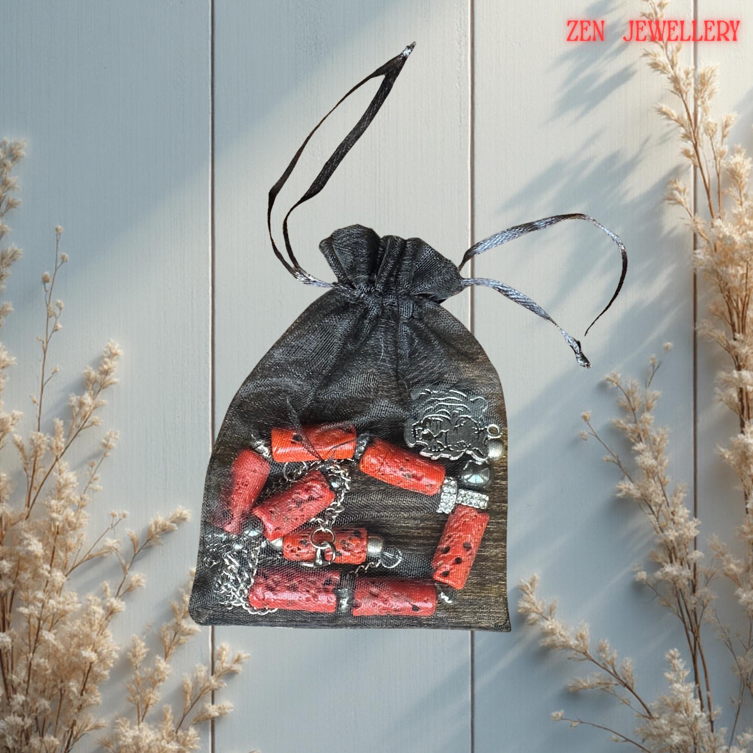 fashion necklace with bold coral beads and stainless steel accents, styled to highlight its vibrant and elegant aesthetic in a gift bag from Zen Jewellery