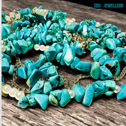 Statement layered necklace and bracelet set with turquoise stones, handmade for gifting or personal style.