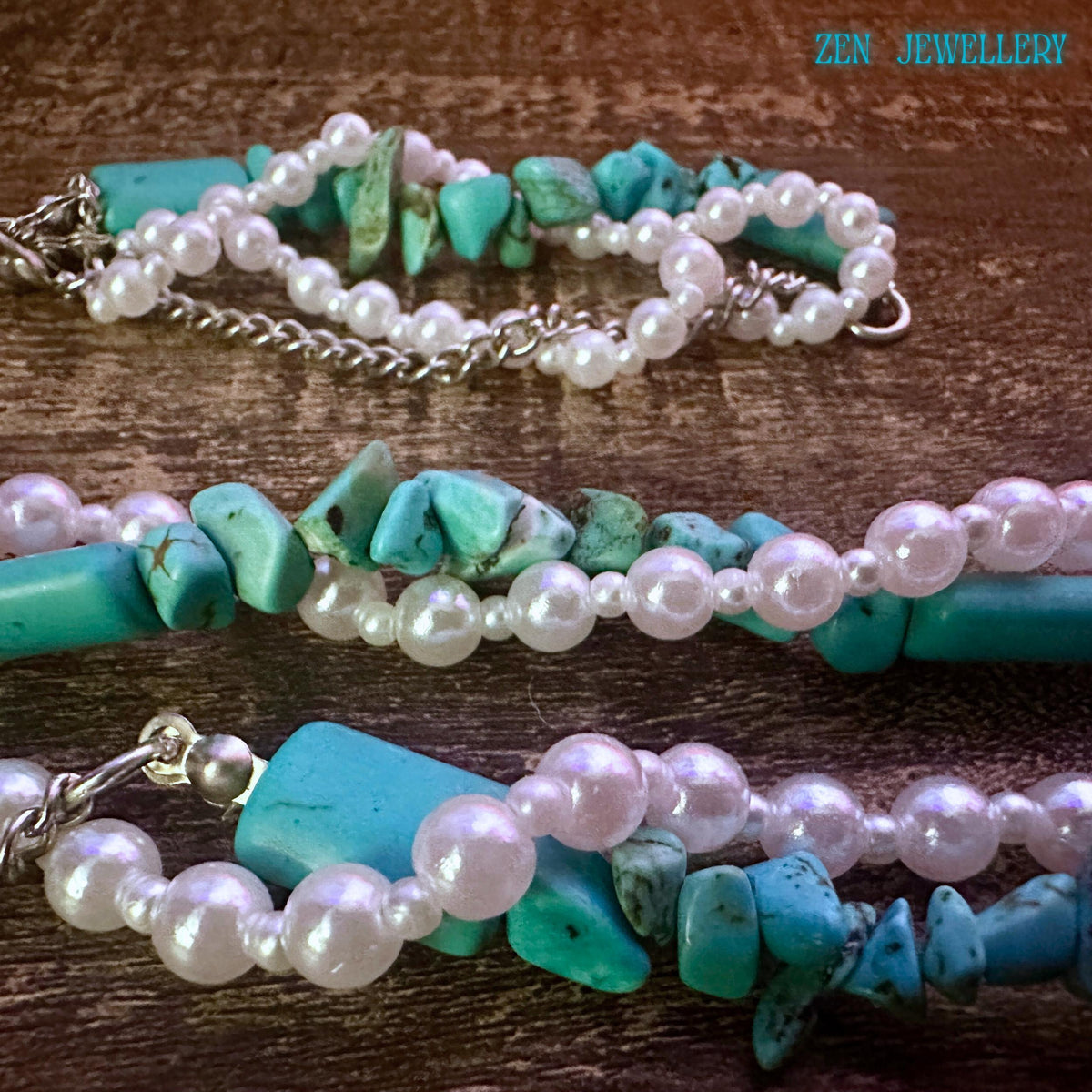 Detailed view of a handmade turquoise pearl necklace with natural stone chips and round pearl beads, displayed on skin to show realistic scale, paired with a matching bracelet and a sterling silver clasp for an elegant finish.