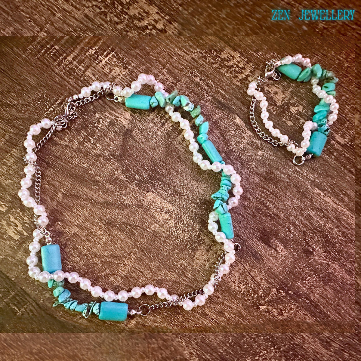 Boho jewellery set with turquoise chips and pearl beads styled on a warm wooden background, necklace forming a soft curve while bracelet sits below, emphasizing 2 strand layered structure and refined silver details.
