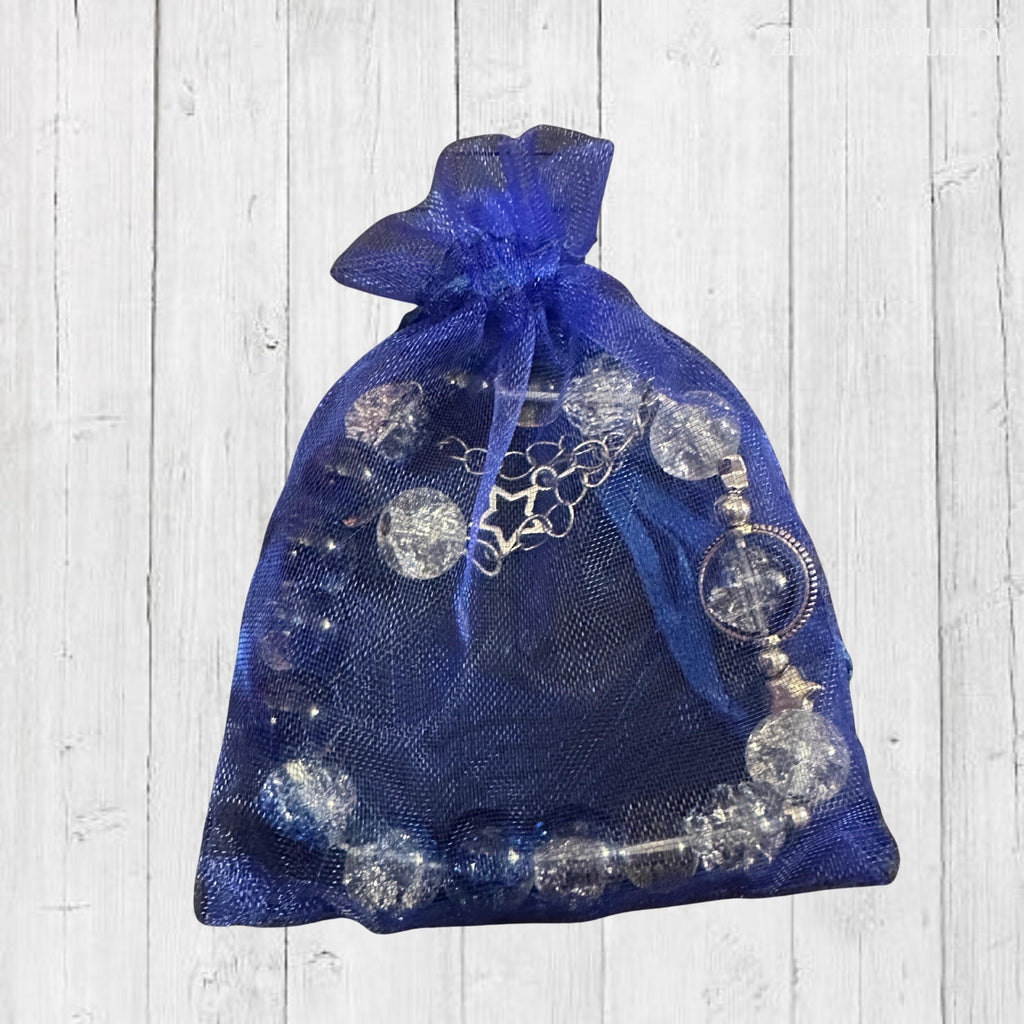 Unique blue glass bracelet with silver star detail, perfect gift for boho jewellery lovers in a gift bag