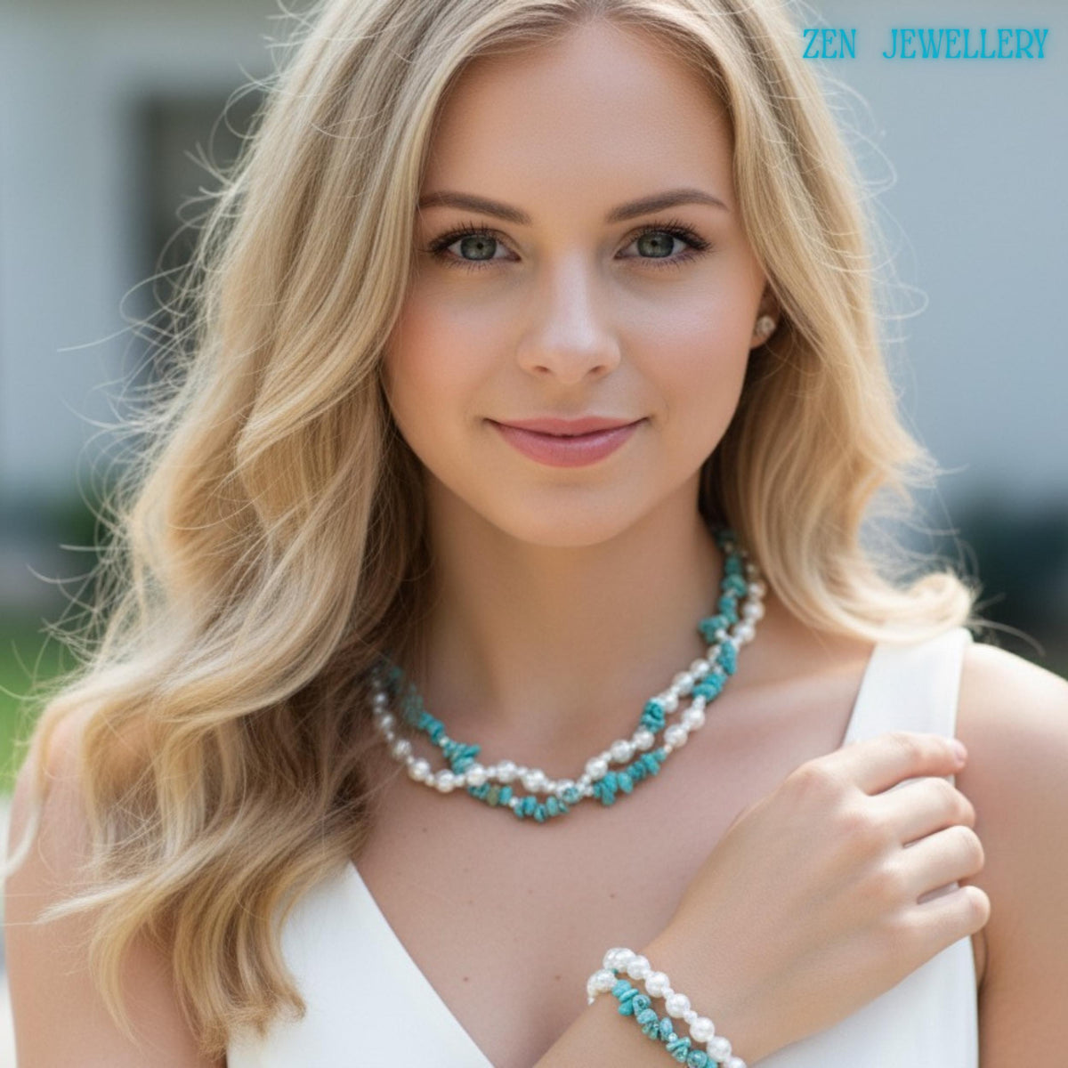 Close up of turquoise chips mixed with round pearl beads showing irregular shapes and smooth surfaces, highlighting handcrafted design and contrast between blue green stones and soft white pearls in layered strands on an elegant blond woman wearing a white dress