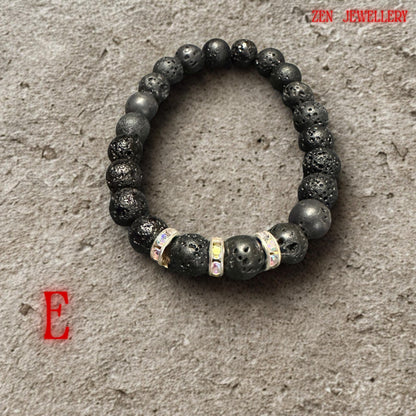 Stylish lava stone bracelet featuring natural volcanic beads and shimmering white rhinestone spacers designed for grounding energy and modern boho fashion. The bracelet has a comfortable stretch fit measuring approximately 17 cm and pairs beautifully with layered jewellery looks.