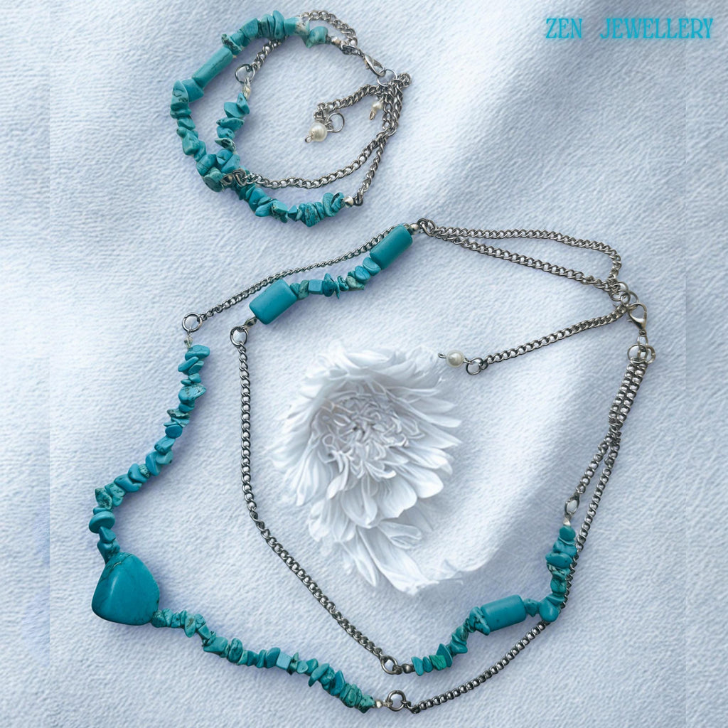 Close-up of the turquoise heart pendant showing smooth polished surface and subtle natural veining, adding a focal point to the necklace design with a soft bohemian romantic touch.