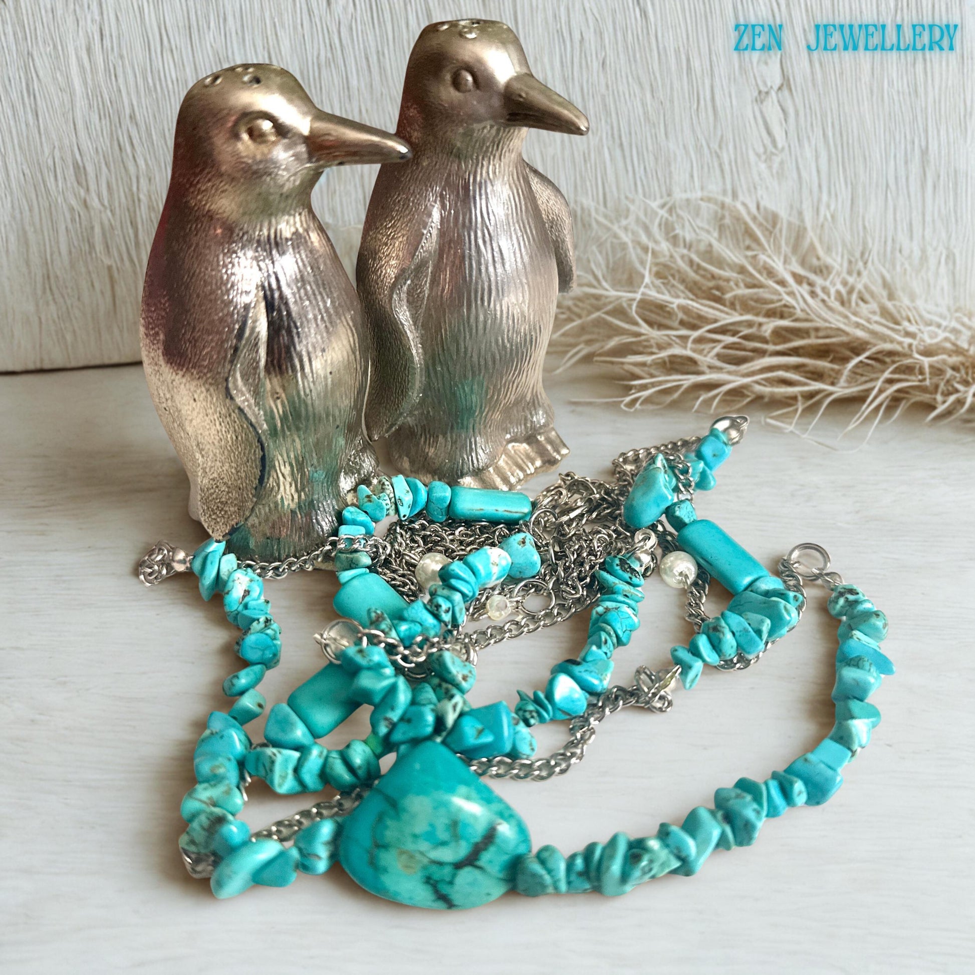 Side angle of the turquoise necklace emphasises the layered chain structure and spacing of chip stones, demonstrating how the piece sits naturally when worn and enhances neckline aesthetics.