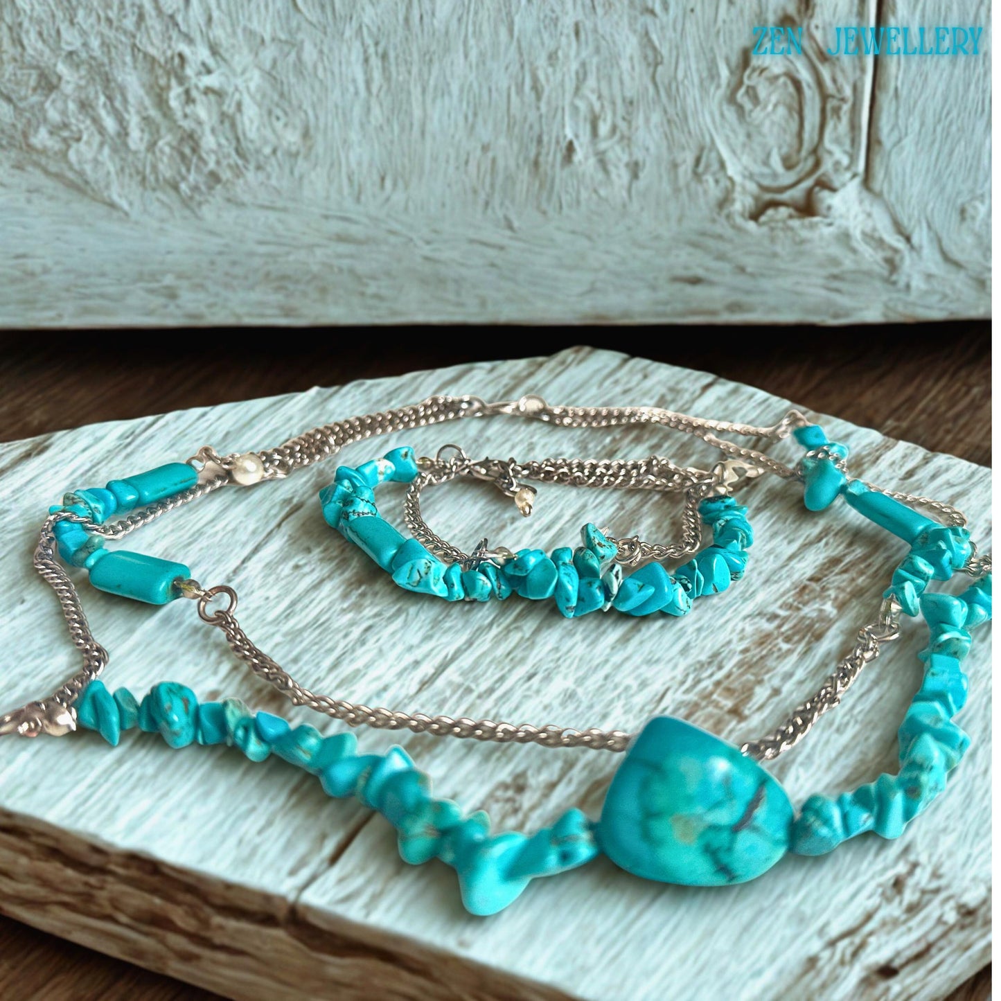 The full jewellery set is arranged flat, showing necklace length and bracelet proportion, with visible clasp and extension chain for adjustability, offering context of size and fit for wrist and neckline styling.