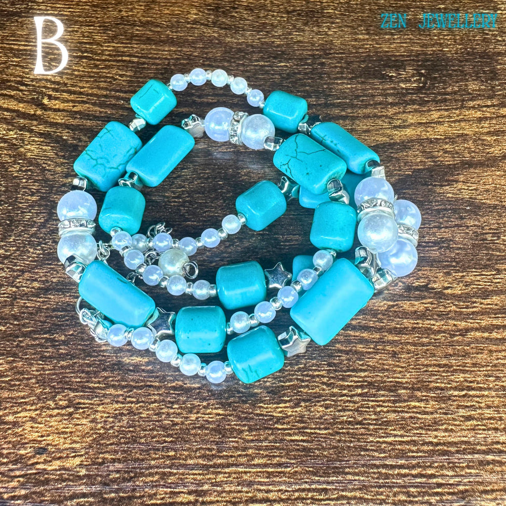 The TURQUOISE PEARL necklace is shown with layered curves emphasising the handcrafted beadwork and elegant boho chic accessories styling. Bright turquoise nuggets contrast with soft white pearl beads and shimmering silver connectors, creating a balanced artistic composition. The rustic wood surface enhances the earthy bohemian mood, while the sterling silver clasp adds premium quality detail.