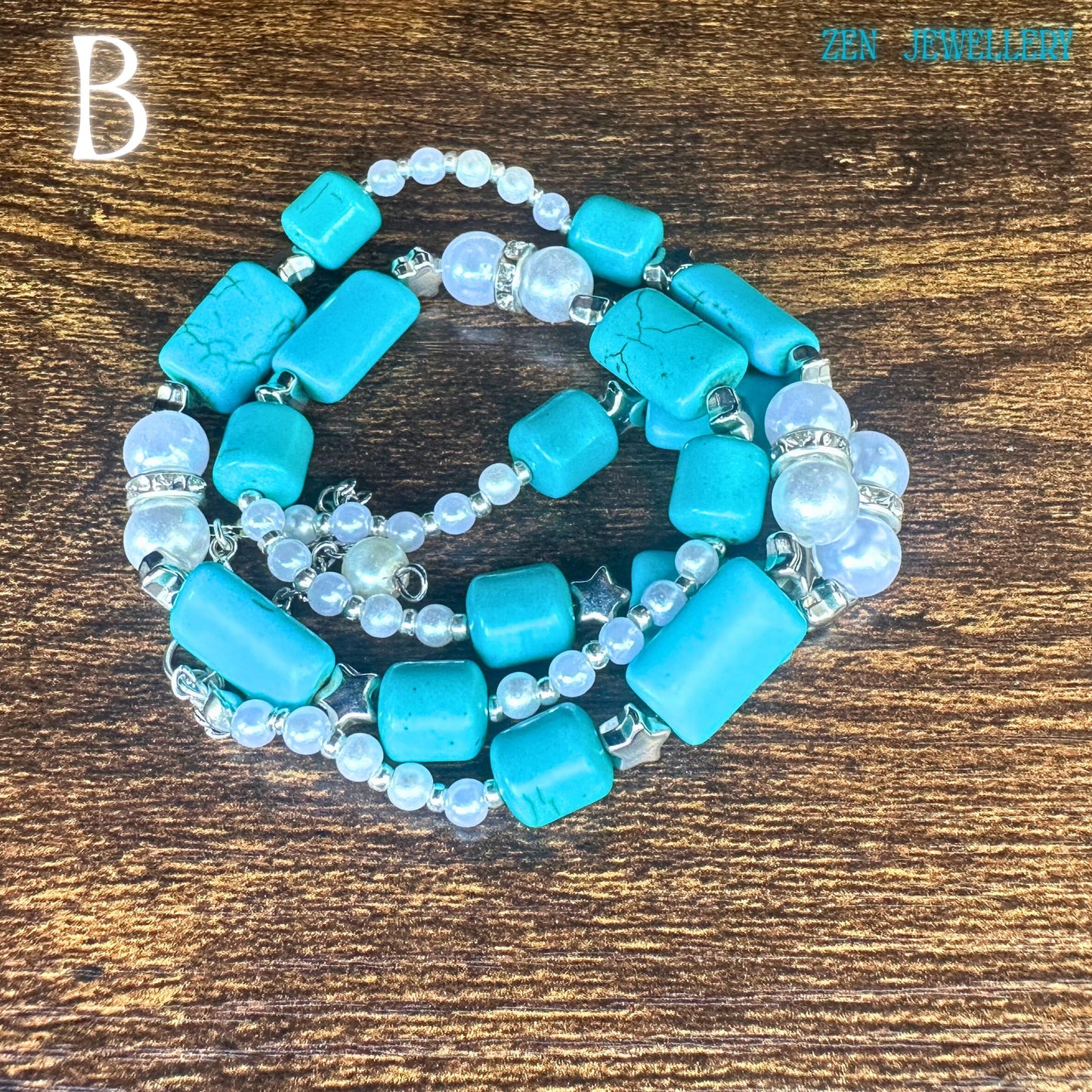 The TURQUOISE PEARL necklace is shown with layered curves emphasising the handcrafted beadwork and elegant boho chic accessories styling. Bright turquoise nuggets contrast with soft white pearl beads and shimmering silver connectors, creating a balanced artistic composition. The rustic wood surface enhances the earthy bohemian mood, while the sterling silver clasp adds premium quality detail.