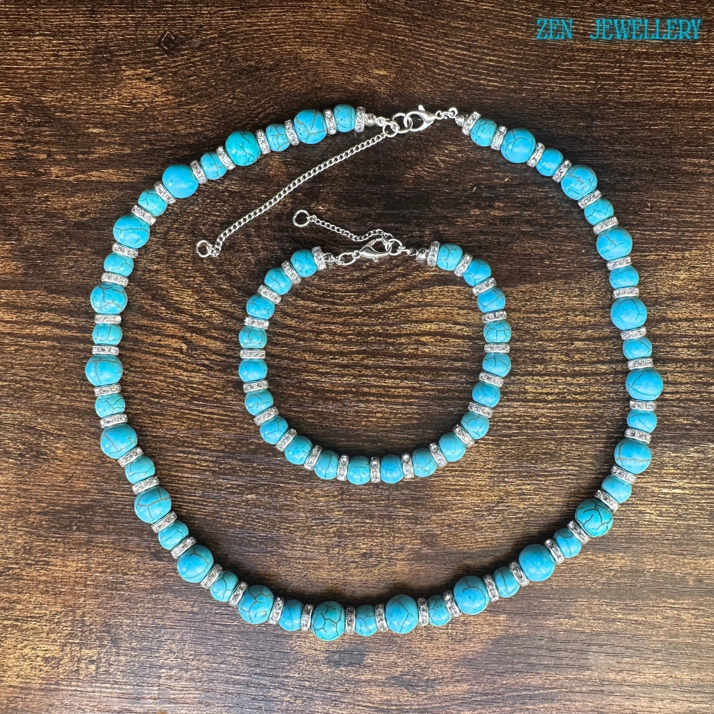 A close-up image capturing the natural turquoise stone veining and the sparkle of rhinestone spacer beads within this handmade turquoise jewellery set. The sterling silver clasps and extension chains provide durability and adjustable comfort, while the artisan bead arrangement creates a refined boho chic aesthetic.