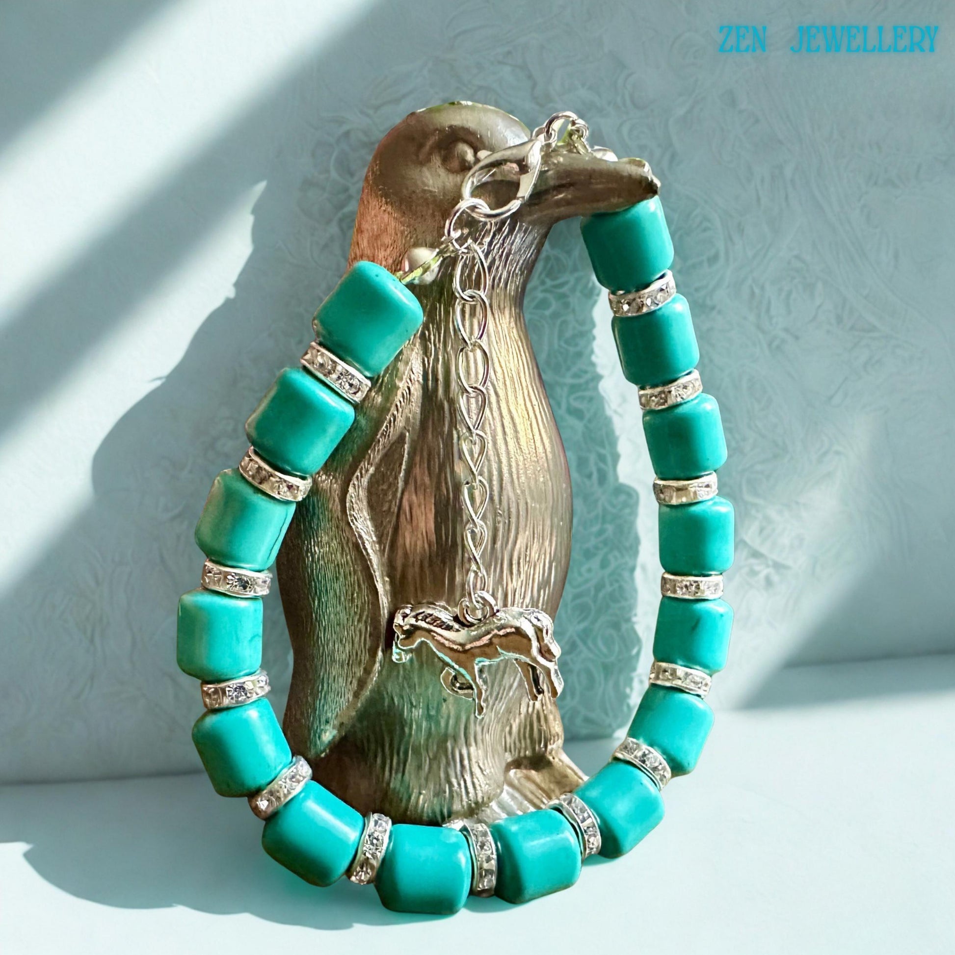 Western-inspired turquoise jewellery bracelet with silver horse charm and crystal spacers designed for layering, casual outfits, boho styling, or meaningful gifting with calming turquoise tones.