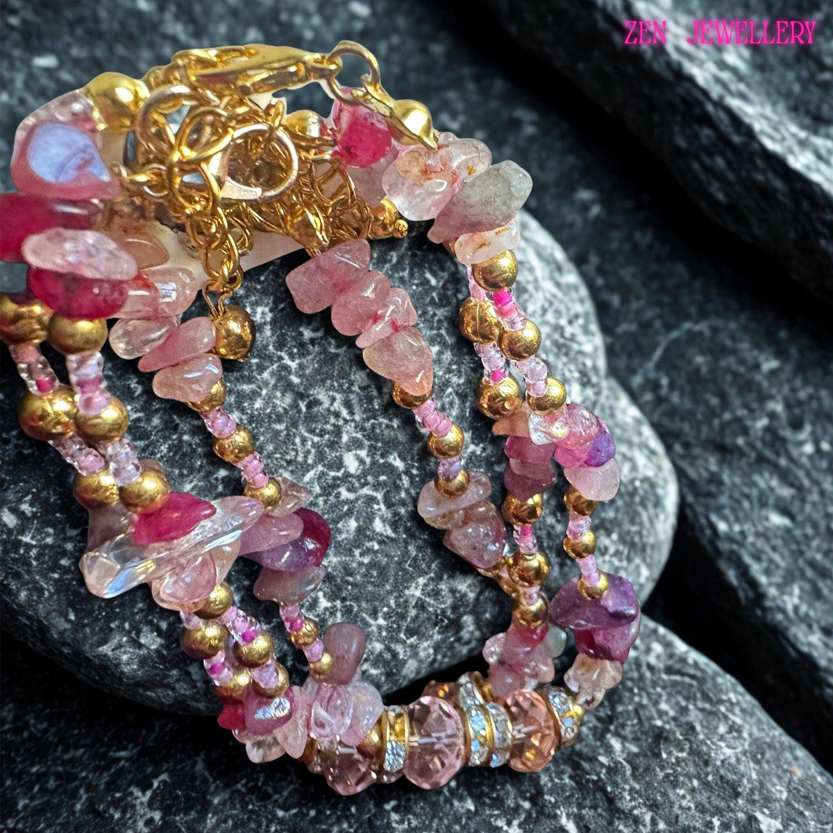 Handmade multi-strand wrap bracelet showcasing beautiful pink gemstones in varying shades of blush, dusty rose, and deep raspberry. Each strand is carefully designed with sparkling crystal beads and gold-tone spacers that enhance the luxurious bohemian style. The bracelet wraps gracefully around the wrist, offering a layered, elegant look ideal for fashion lovers who enjoy feminine, romantic accessories with a touch of natural gemstone beauty and