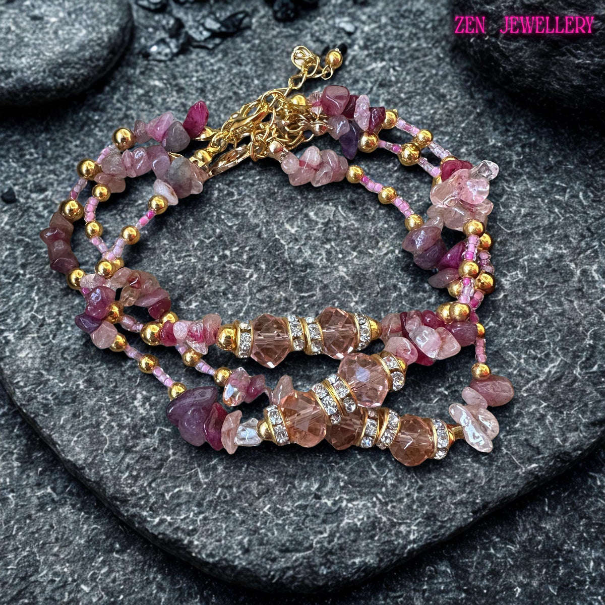 Romantic pink crystal wrap bracelet designed with layered strands of gemstone chips in blush, rose, and raspberry shades. The bracelet is enhanced with sparkling faceted beads and gold-tone accents that reflect light beautifully. Its wrap-around design creates a luxurious stacked effect on the wrist. This feminine accessory is ideal for gifting, weddings, date nights, or adding a soft boho-chic touch to everyday outfits and seasonal fashion looks