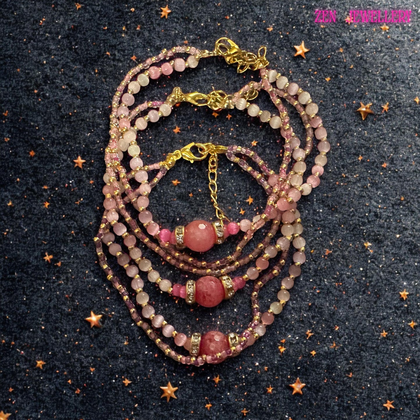 A detailed close up reveals the texture and finish of the rose crystal beads, showing their translucent appearance and subtle natural colour variations. Tiny seed beads in pink, white, and gold are carefully arranged into repeating patterns across the secondary strands. The central faceted crystal bead is framed by silver tone rhinestone rings that provide a glamorous finishing touch. The adjustable bracelet design ensures flexibility for differe