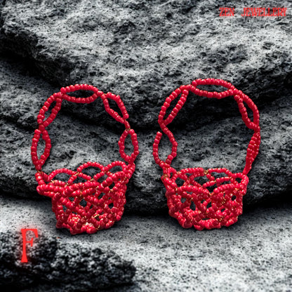 The photo presents the decorative bowls resting on a stone, adding a bright red accent to the home décor.