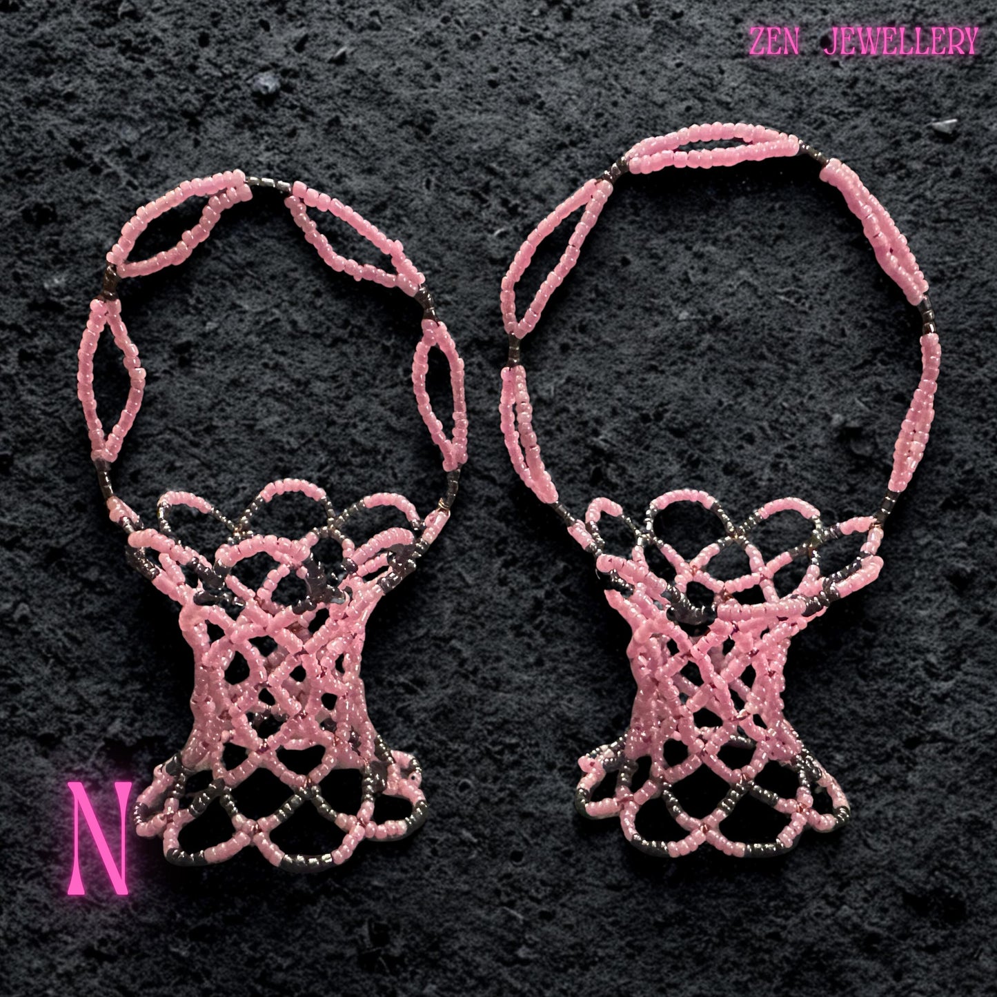 Handmade pink Miyuki basket displaying matched colour blends and polished bead texture.