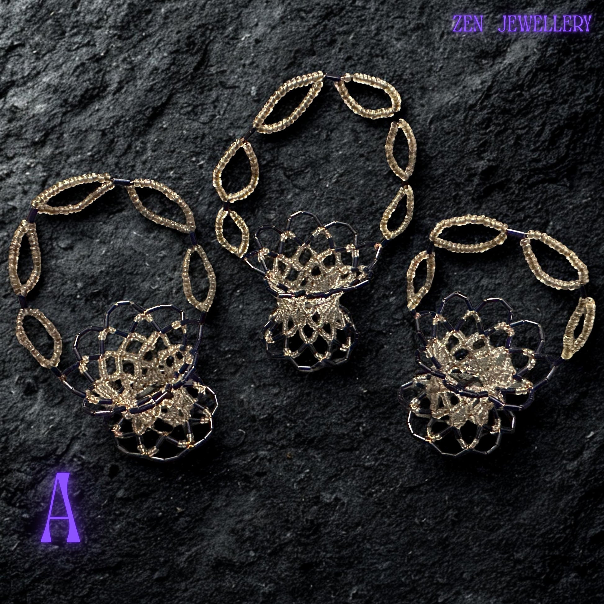 Handcrafted decorative bowl with glossy purple and champagne beads arranged in a smooth, artistic pattern