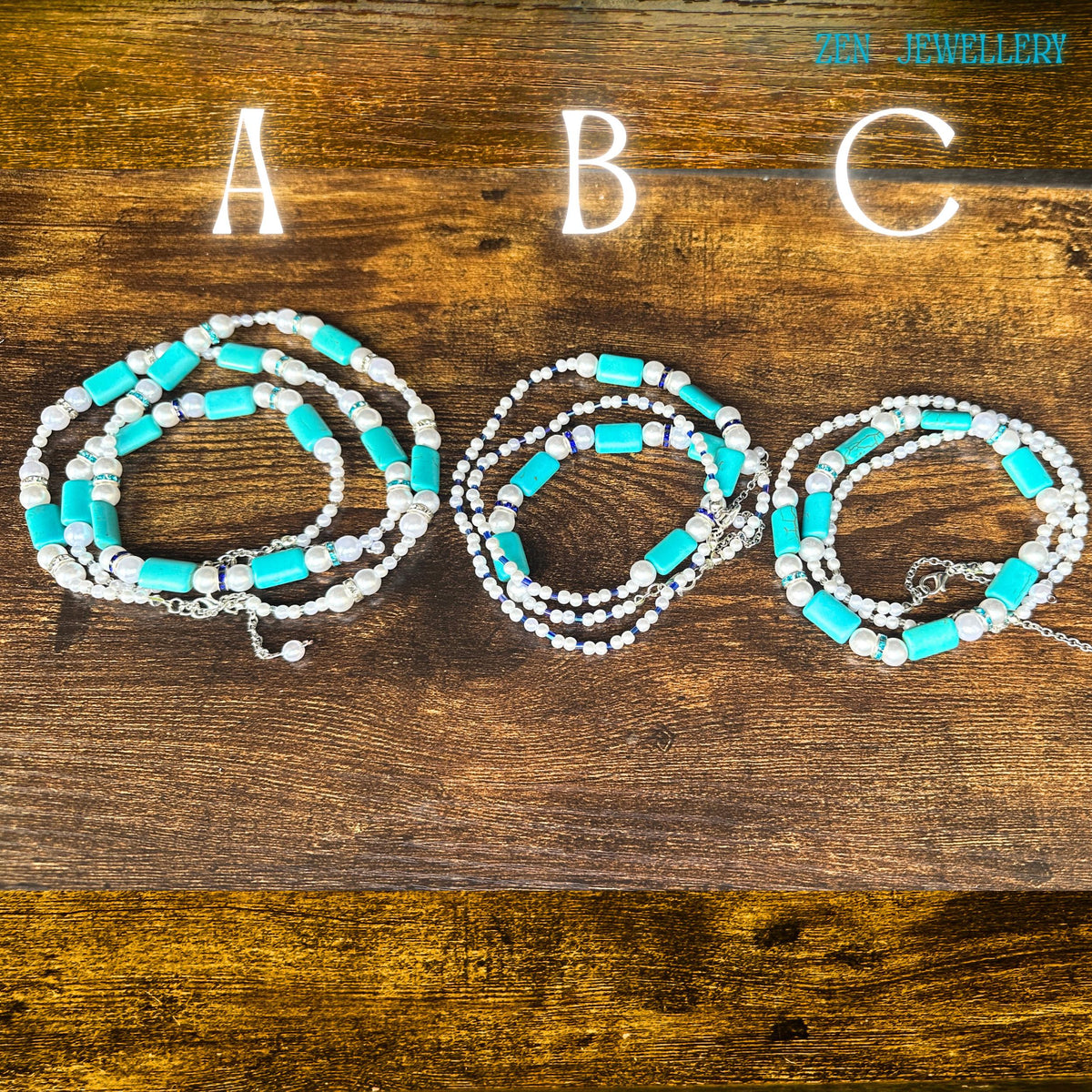 Elegant pearl and turquoise necklace arranged to highlight the detailed Miyuki bead accents.