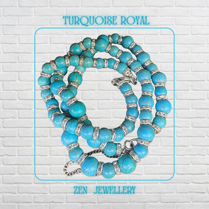 A detailed overhead image of the TURQUOISE rhinestone necklace and bracelet set showing polished turquoise beads separated by silver rhinestone spacers that softly reflect light. The handcrafted jewellery arrangement highlights the symmetry of the matching pieces, while the sterling silver lobster clasps and extension chains add premium finishing details.