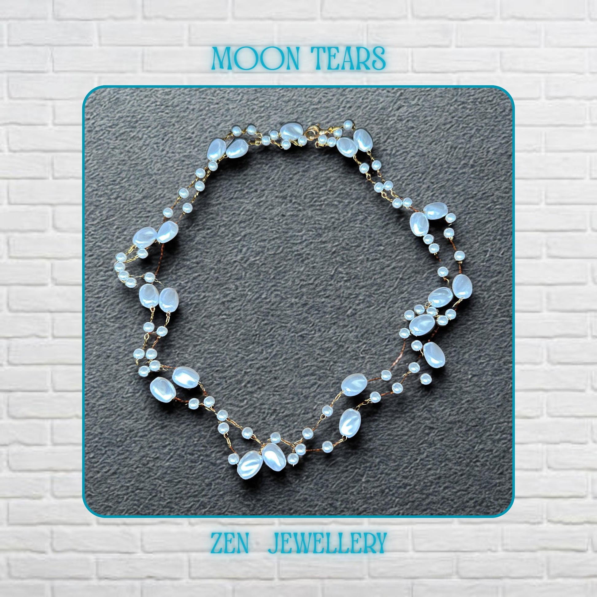The elegant white bead necklace is displayed flat to show the flowing arrangement of oval beads, small pearl-style beads, and fine gold chain connections. The glossy white beads reflect light softly and create a feminine and romantic appearance. The lightweight handmade design feels delicate yet eye-catching with a timeless pearl-inspired aesthetic.