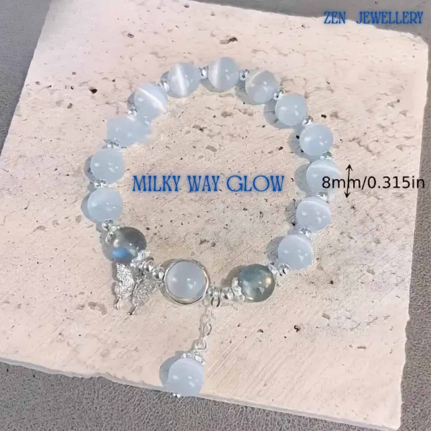 Detailed image focusing on the centrepiece featuring a bezel-set white gemstone charm framed by polished silver-toned metal, accompanied by a decorative butterfly charm symbolising beauty, transformation and freedom, while the surrounding gemstone arrangement enhances the bracelet's romantic appearance and luxurious handcrafted finish for jewellery lovers seeking distinctive accessories.
