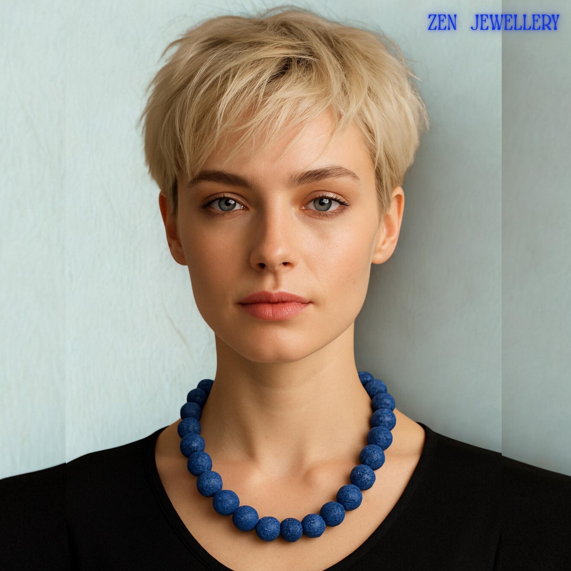 This bohemian lava stone necklace and bracelet set combines grounding volcanic beads with elegant rhinestone spacer accents for a stylish handmade appearance. The navy blue lava stones create calming earthy texture and depth, while the silver clasp and chain details add a polished and sophisticated finishing touch.