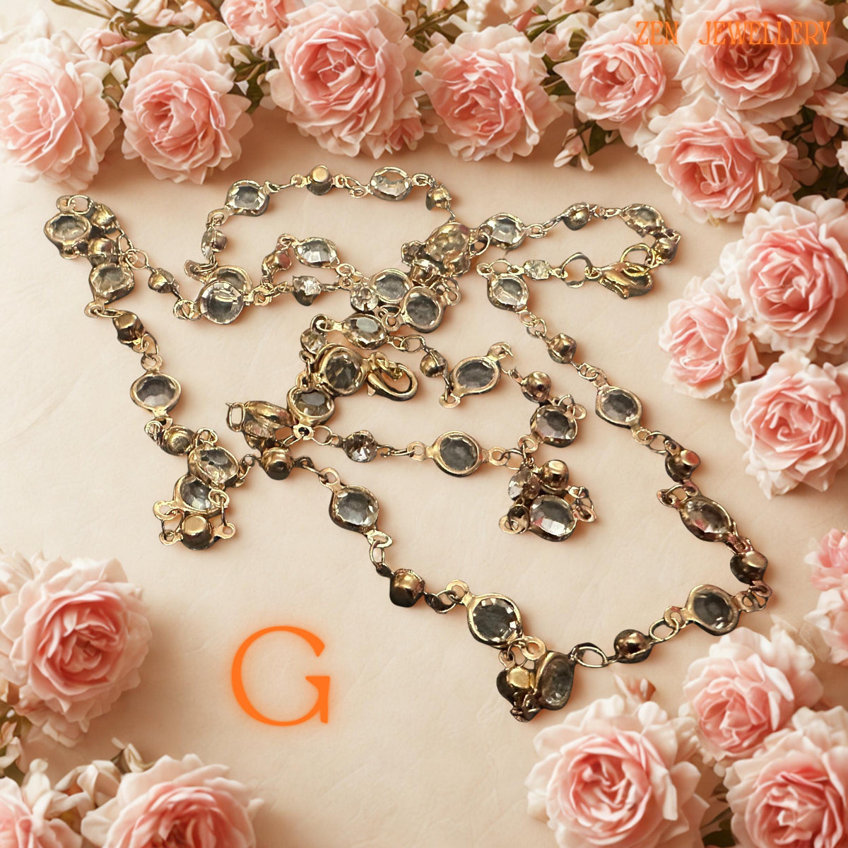 Austrian crystal necklace and bracelet displayed on a neutral background, showcasing fine golden detailing and natural sparkle.