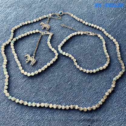 Handmade boho necklace with natural-inspired glass beads and horse pendant charm for gifting.
