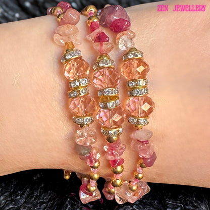 Boho luxury wrap bracelet crafted with multiple strands of pink gemstones including blush, rose, and raspberry chips, combined with sparkling crystal beads and elegant gold-tone details. The bracelet wraps comfortably around the wrist, creating a stacked layered effect that is both feminine and stylish. This handcrafted accessory blends natural gemstone textures with refined sparkle, making it ideal for gifting, styling, or everyday elegant wear.