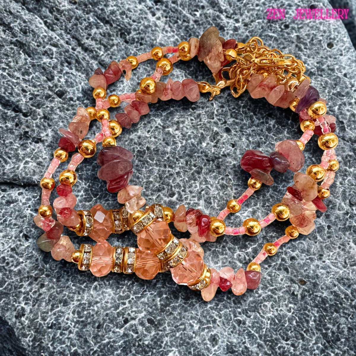 5
Feminine handmade gemstone bracelet featuring soft pink tones with blush, rose, and raspberry crystal-like stone chips carefully arranged in a multi-layer wrap design. The bracelet includes shimmering faceted crystal beads and gold accents that elevate its luxurious bohemian style. Designed for elegance and versatility, it wraps beautifully around the wrist, making it suitable for casual outfits, romantic looks, weddings, and special occasions.