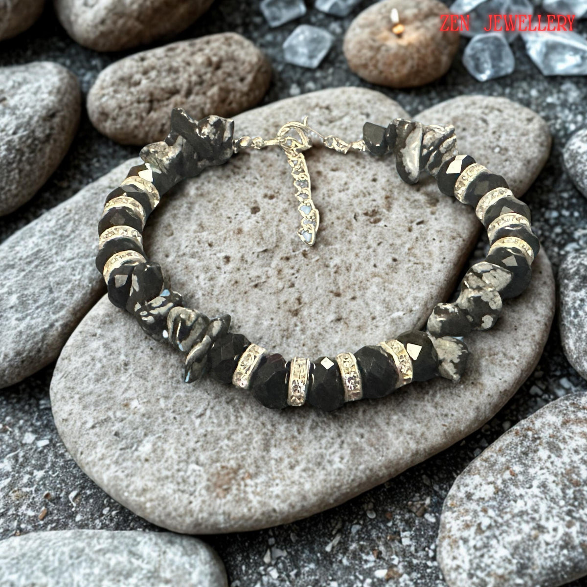 Detailed close-up of the silver clasp and extension chain. The polished silver components provide secure fastening while allowing adjustable sizing for greater comfort. The quality hardware complements the black and grey colour palette while adding durability and functionality to the bracelet.