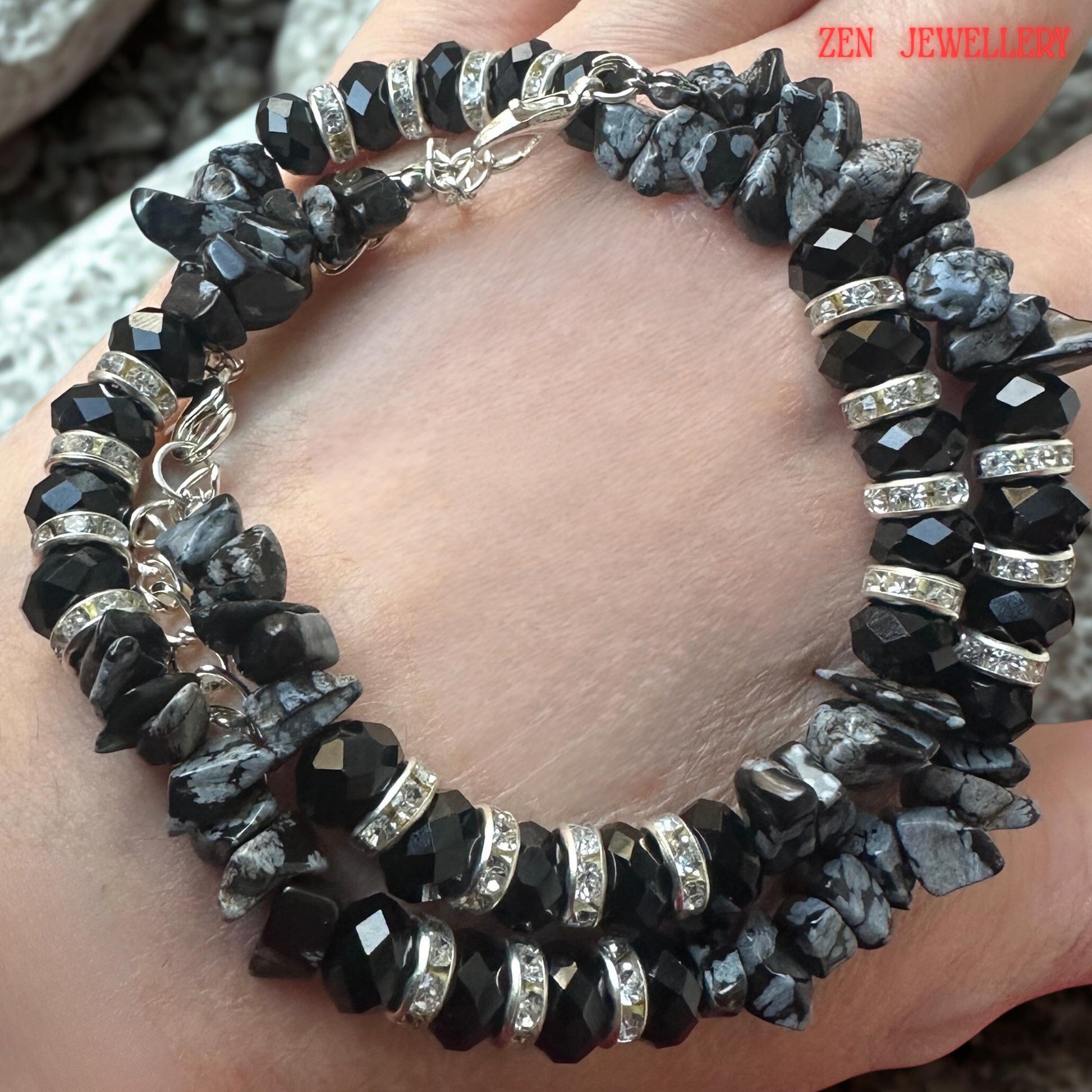Close-up perspective focusing on the faceted crystal beads. Their geometric surfaces reflect light from multiple angles, creating subtle sparkle and sophistication. The rich black colour enhances the bracelet's modern and glamorous aesthetic while remaining versatile for many outfits.