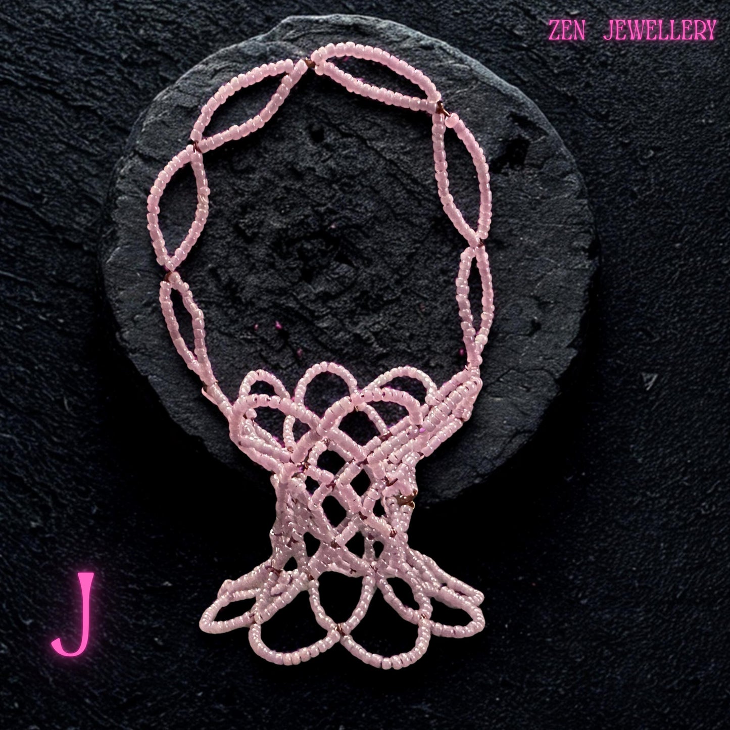 Close detail of the glossy pink Miyuki beads woven into a sturdy decorative bowl.