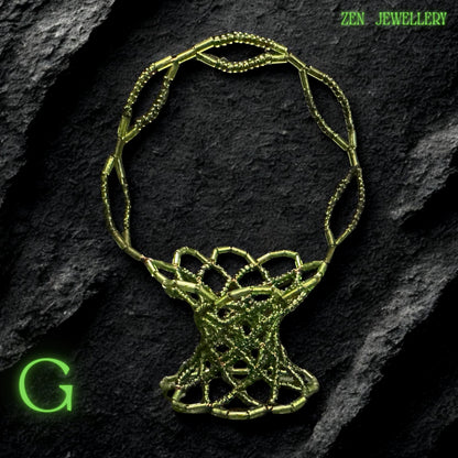 Compact green bead basket used as a trinket holder, photographed to show its refined texture