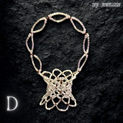 Decorative bowl crafted from Japanese Miyuki seed beads arranged in a delicate, handwoven pattern.