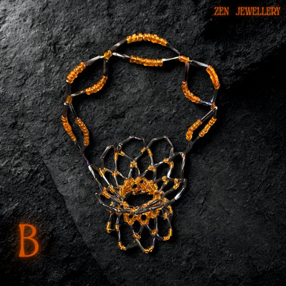 Overhead view of the handcrafted basket showing its symmetrical orange and black bead arrangement.