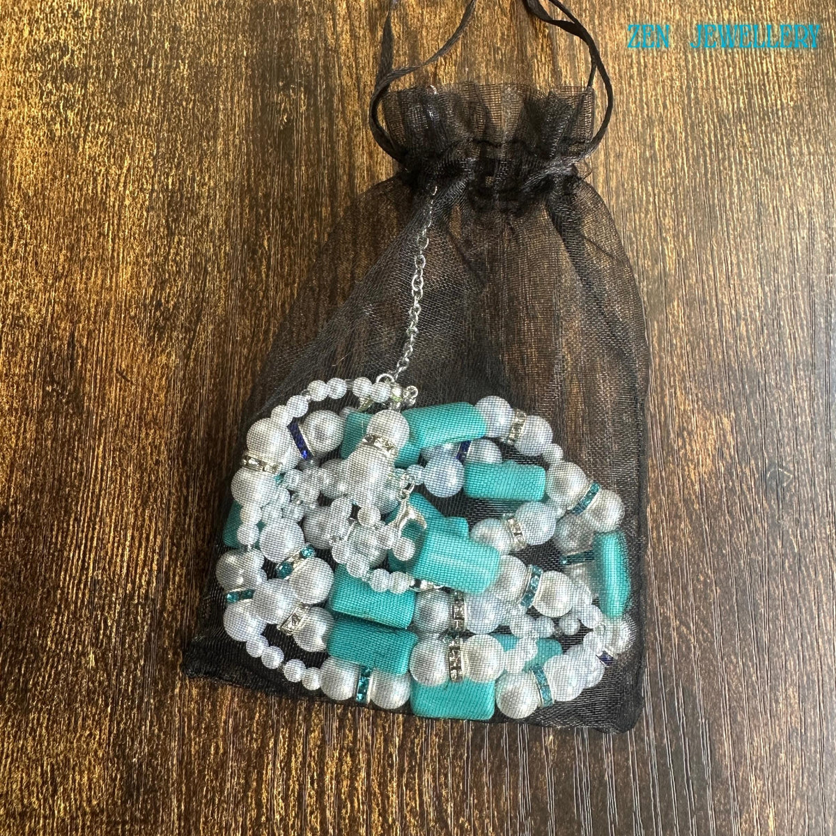 Necklace and bracelet set with wonderful turquoise beads and pearls in a gift bag