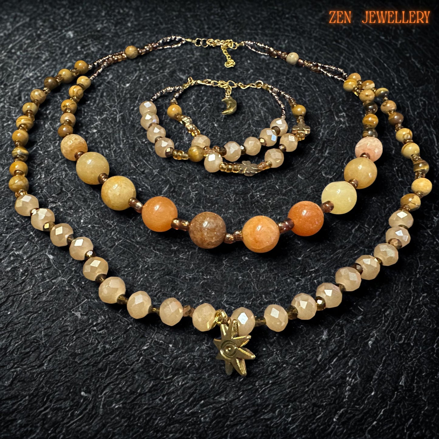 Matching bracelet shown with the same warm gemstone colour palette and delicate gold details. The bracelet looks lightweight and comfortable, with a handmade artisan finish that pairs beautifully with the necklace. Close detail of the polished gemstone beads showing natural variations in tone from soft beige to warm honey and amber. The faceted crystal beads add sparkle and depth, making the jewellery feel rich and luxurious.