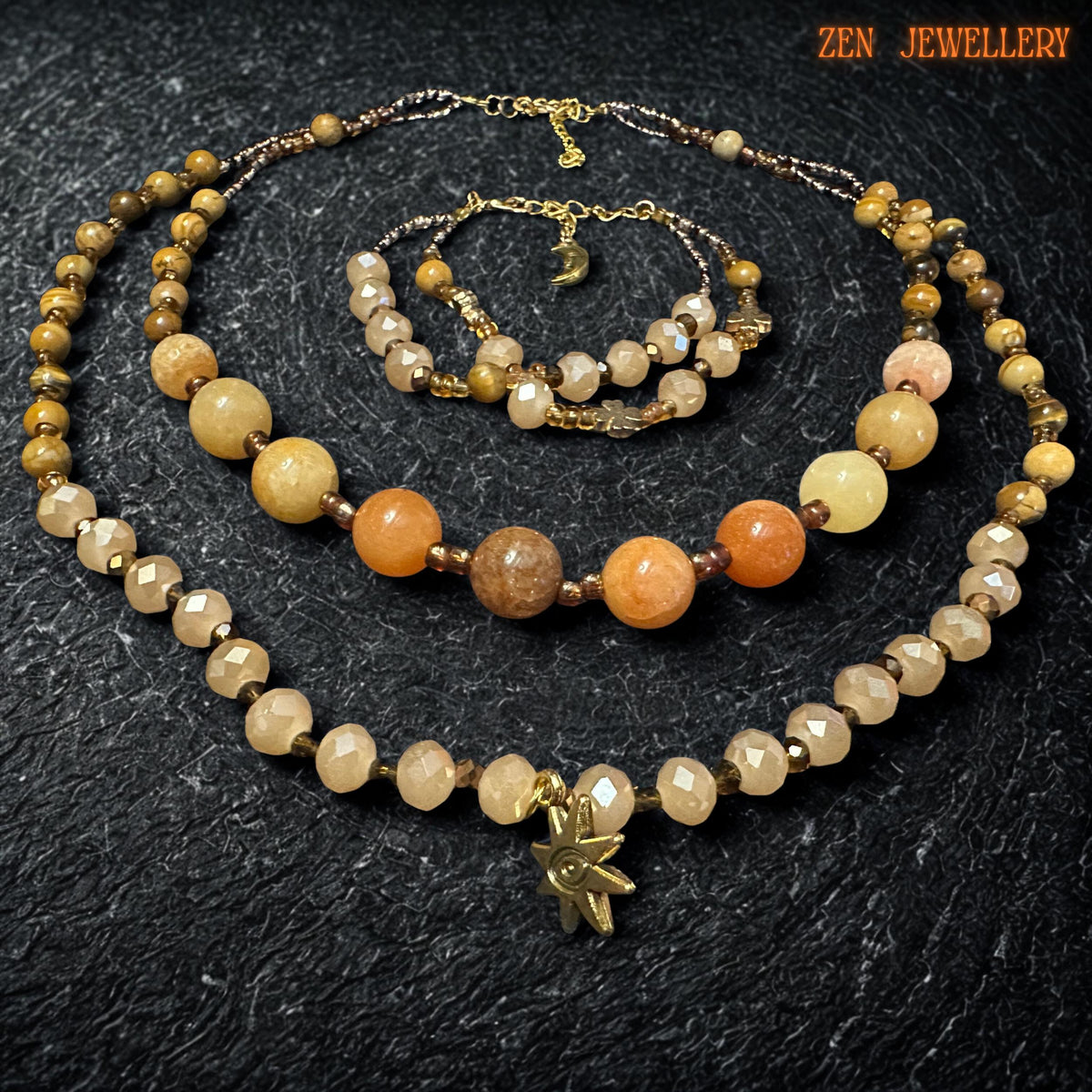 Matching bracelet shown with the same warm gemstone colour palette and delicate gold details. The bracelet looks lightweight and comfortable, with a handmade artisan finish that pairs beautifully with the necklace. Close detail of the polished gemstone beads showing natural variations in tone from soft beige to warm honey and amber. The faceted crystal beads add sparkle and depth, making the jewellery feel rich and luxurious.