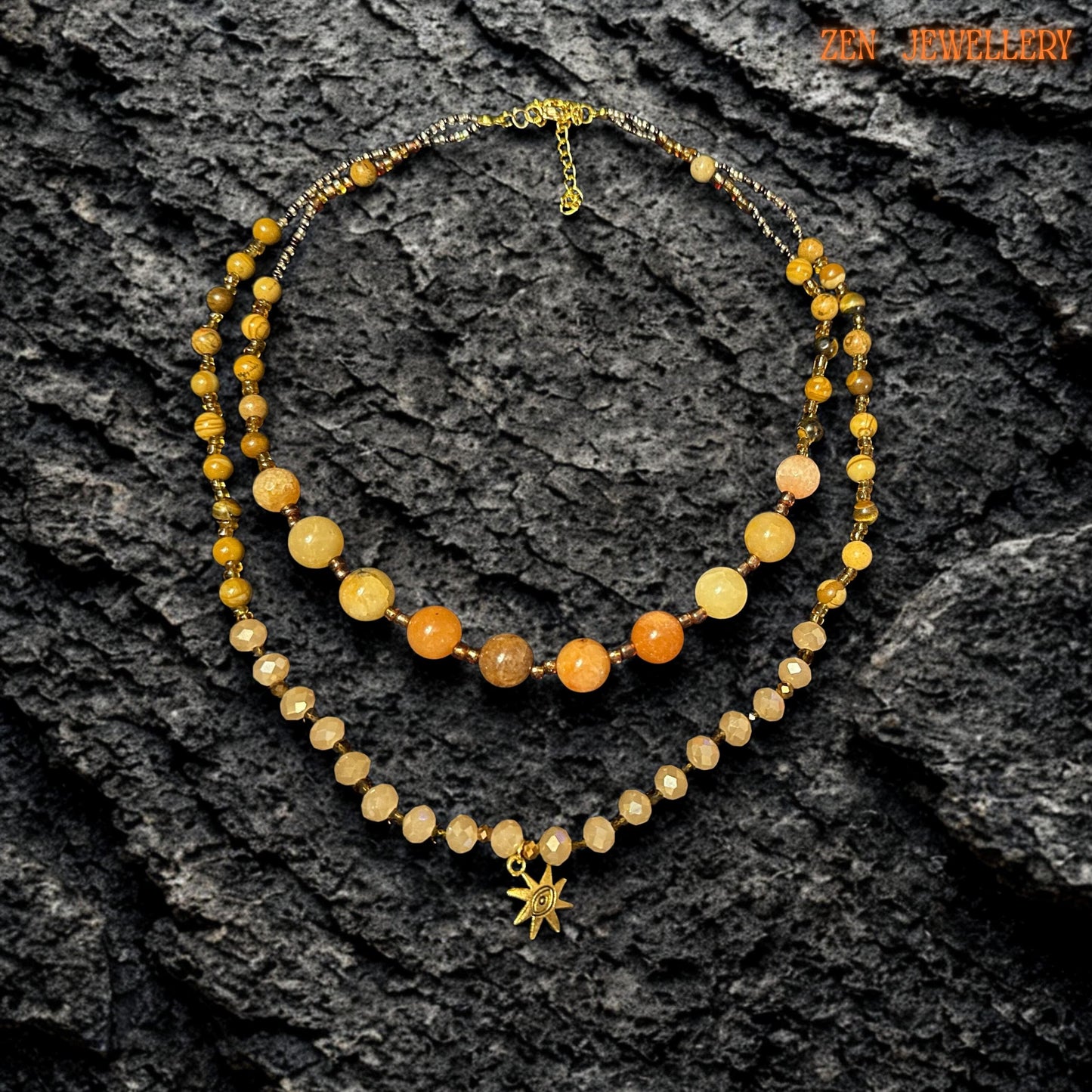 Elegant layered necklace arranged flat to show the full design, bead spacing, and clasp details. The necklace includes two strands and mirrors the warm golden colour palette for a coordinated handmade jewellery set.