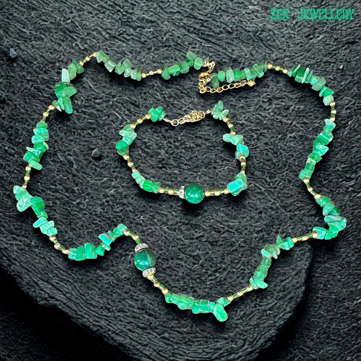Handmade green crystal necklace with textured gemstone chips and rhinestone focal bead designed for boho, summer, and romantic styling. Close-up image of green jade chips paired with warm golden beads, creating contrast between earthy gemstones and luxurious metallic shine.
