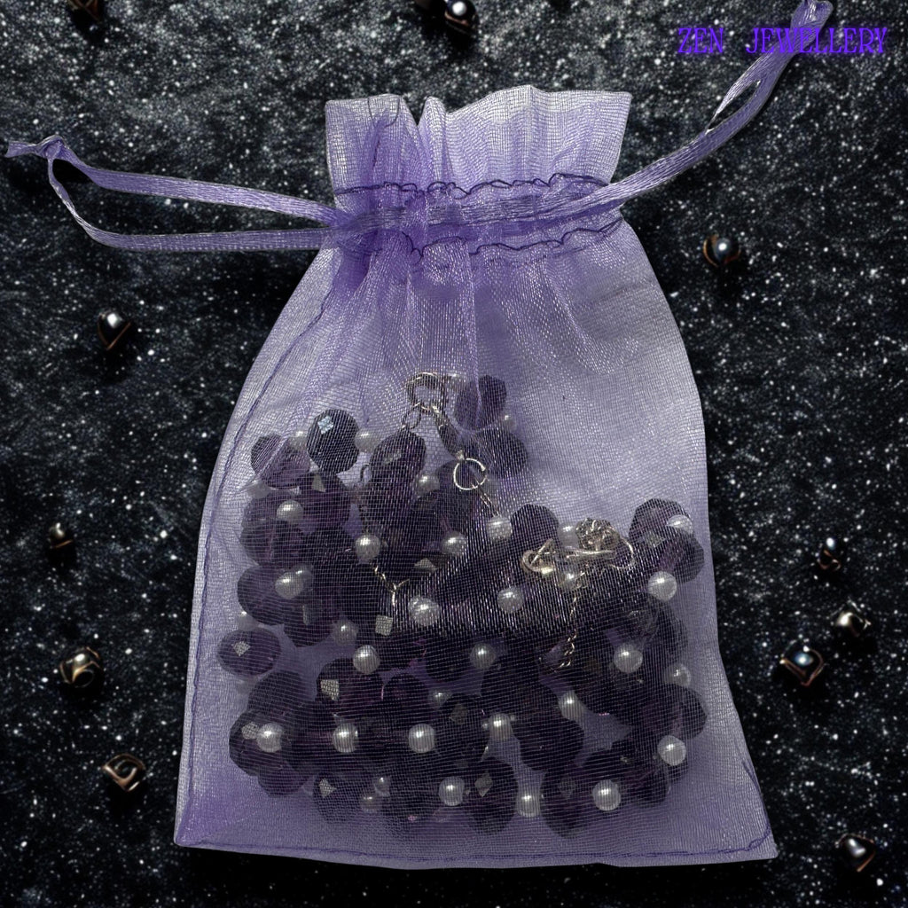 Purple crystal and pearl necklace and bracelet set in a gift bag
